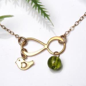 Gold Infinity Necklace With Bird Initial..