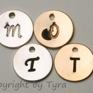 Two Initial letter charms, sterling..